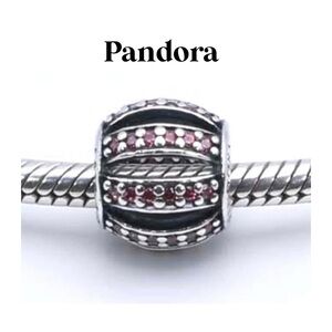 PANDORA Sterling SilverOpenwork silver charm with pave pink cubic zircon…
